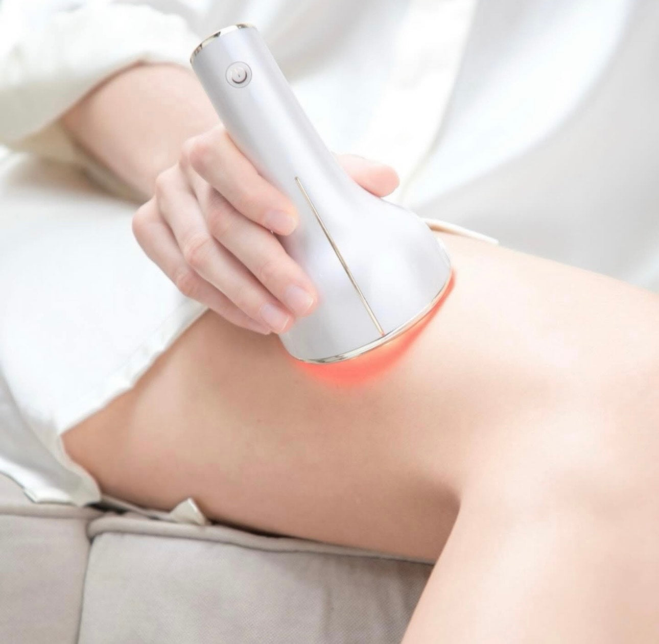 SLIMÉA MASSAGER handheld device with ergonomic handle, designed for cellulite reduction, body toning, and muscle relaxation.